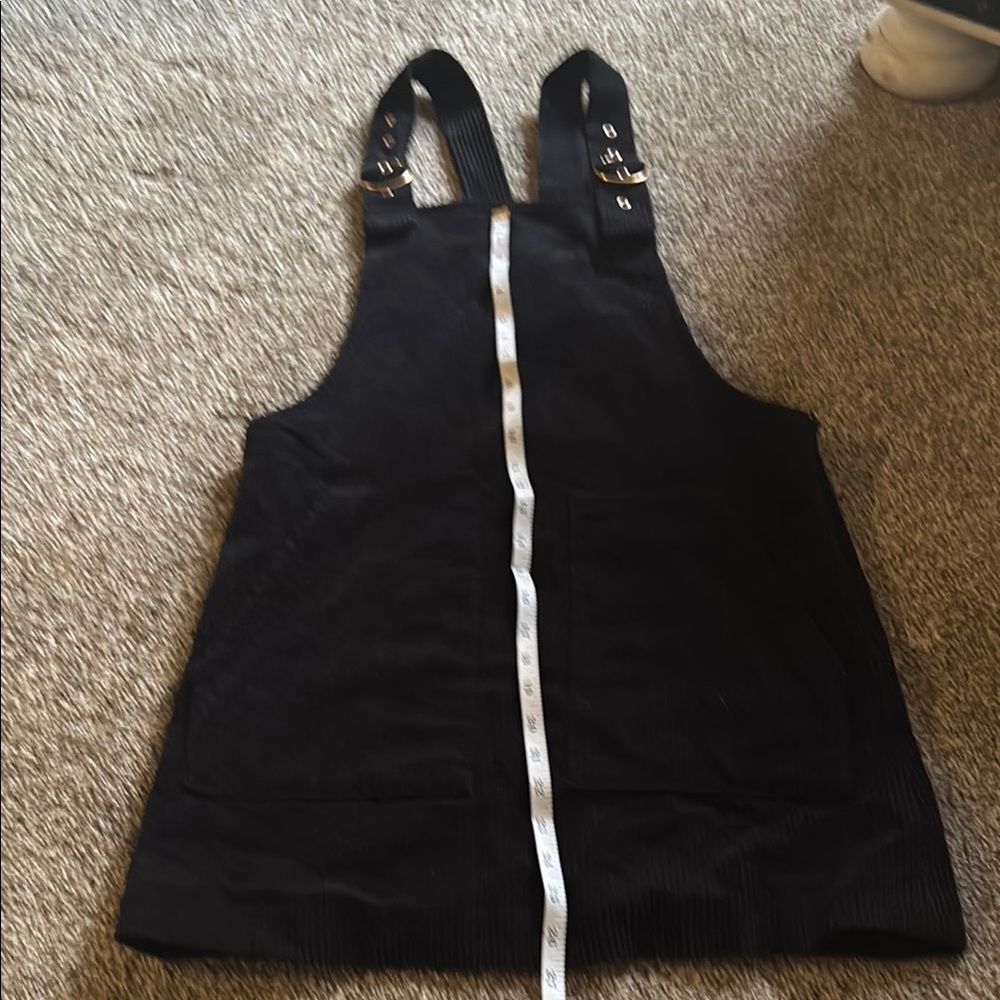 Women’s buckle/overall strap corduroy black mini dress